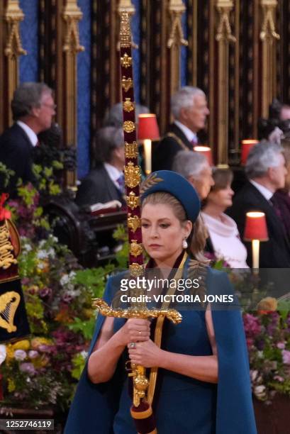Lord President of the Council, Penny Mordaunt, carries the Sword of State ahead of the coronations of Britain's King Charles III and Britain's...