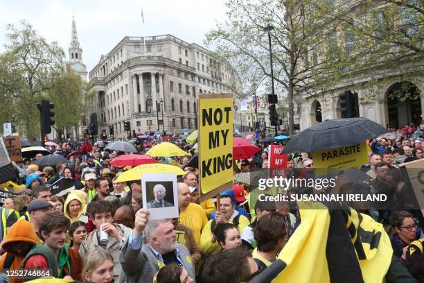 Members of the anti-monarchist group Republic stage a protest in Trafalgar Square close to where Britain's King Charles III and Britain's Camilla,...