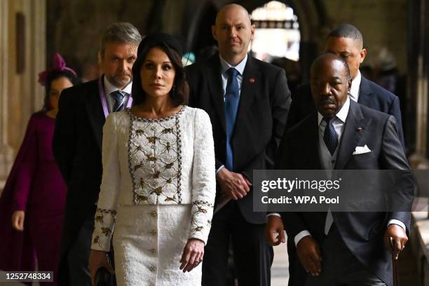 Gabonese President Ali Bongo Ondimba and wife Sylvia Bongo Ondimba arrive to take their seats ahead of the Coronation of King Charles III and Queen...