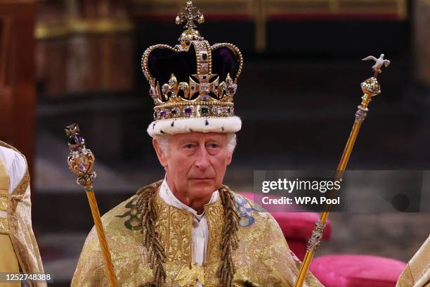 King Charles III stands after being crowned during his coronation ceremony in Westminster Abbey, on May 6, 2023 in London, England. The Coronation of...