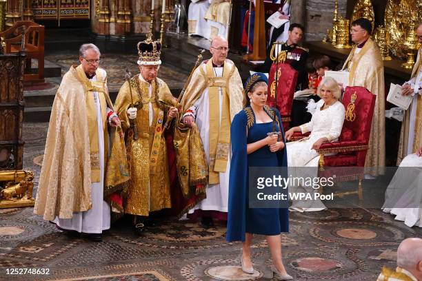 Camilla, Queen Consort looks on as Penny Mordaunt leads King Charles III wearing the St Edward's Crown during his coronation ceremony in Westminster...
