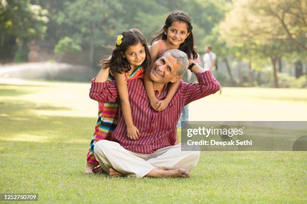 multi generation family - stock images - indian grandparents stock pictures, royalty-free photos & images