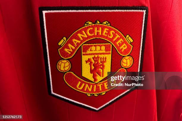 Manchester United logo is seen on a football jersey in this illustration photo taken in a store in Krakow, Poland on May 6, 2023.