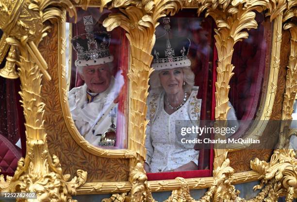 Their Majesties King Charles III and Queen Camilla make their way along the Mall following their Coronation on May 6, 2023 in London, England. The...
