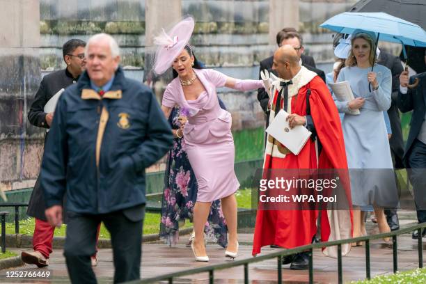 Katy Perry leaves Westminster Abbey following the coronation ceremony of King Charles III and Queen Camilla on May 6, 2023 in London, England. The...