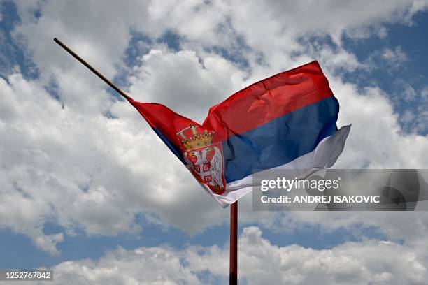 This photograph shows the Serbian flag at half mast in the village of Malo Orasje near the town of Mladenovac, about 60 kilometres south of Serbia's...