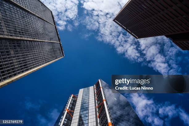 skyscrapers against the sky. - capitalismo foto e immagini stock