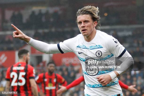 Chelsea's English midfielder Conor Gallagher celebrates scoring his team's first goal during the English Premier League football match between...