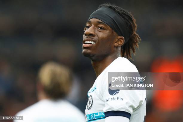 Chelsea's English striker Noni Madueke reacts after missing a shot during the English Premier League football match between Bournemouth and Chelsea...