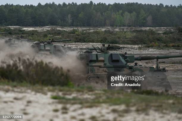 Krabs, a 155 mm NATO-compatible self-propelled tracked gun-howitzer, are seen during a military high-intensity training session of Anaconda 23 at...
