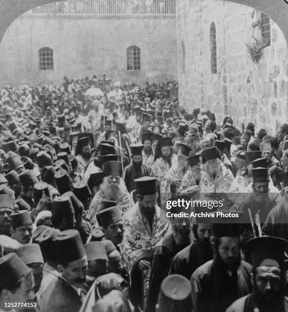 The Easter Procession of the Greek Patriarch enters the Church of the Holy Sepulchre in Jerusalem, 1900.