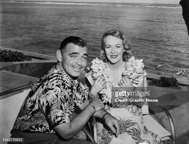 American actor Clark Gable with his wife, actress Sylvia Ashley during their honeymoon in Hawaii, 1950.