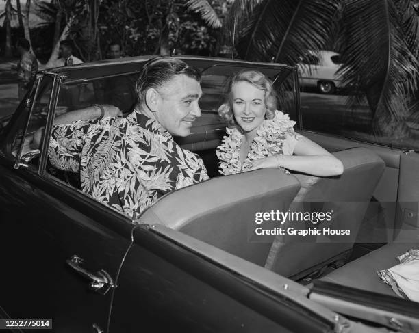 American actor Clark Gable with his wife, actress Sylvia Ashley during their honeymoon in Hawaii, 1950.