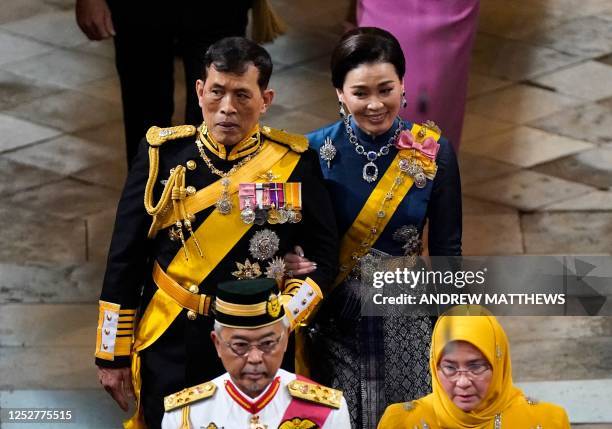 King Vajiralongkorn and Queen Suthida of Thailand arrive at Westminster Abbey in central London on May 6 ahead of the coronations of Britain's King...