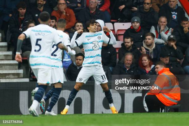 Chelsea's Portuguese striker Joao Felix celebrates scoring his team's third goal during the English Premier League football match between Bournemouth...