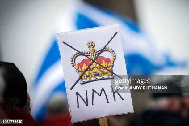 Members of the public attend a "Rally For A Republic - Not My King" anti-monarchy rally on Calton Hill in Edinburgh on May 6, 2023 following the...