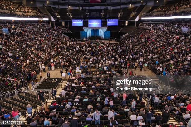 Attendees arrive at the auditorium of the CHI Health Center during the Berkshire Hathaway annual meeting in Omaha, Nebraska, US, on Saturday, May 6,...