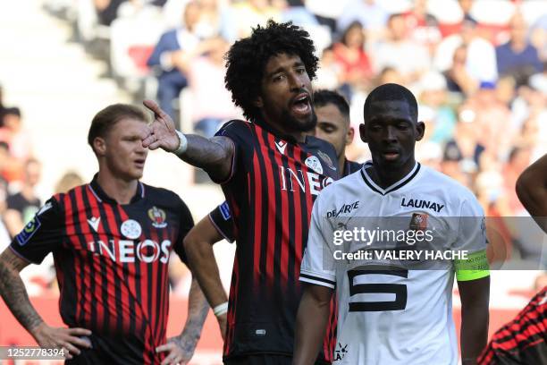 Nice's Brazilian defender Dante reacts during the French L1 football match between OGC Nice and FC Rennes at the Allianz Riviera Stadium in Nice,...