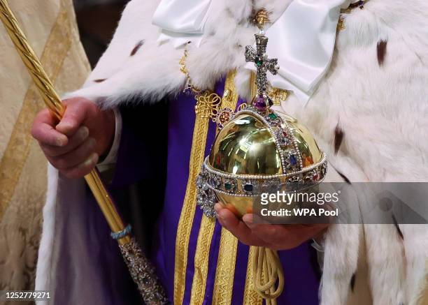King Charles III, Sovereign's Orb and Sceptre detail, departs following his coronation ceremony at Westminster Abbey on May 6, 2023 in London,...