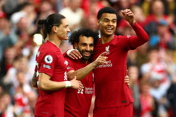 Mohamed Salah of Liverpool celebrates scoring a goal to make the score 1-0 with Darwin Nunez & Cody Gapko during the Premier League match between...