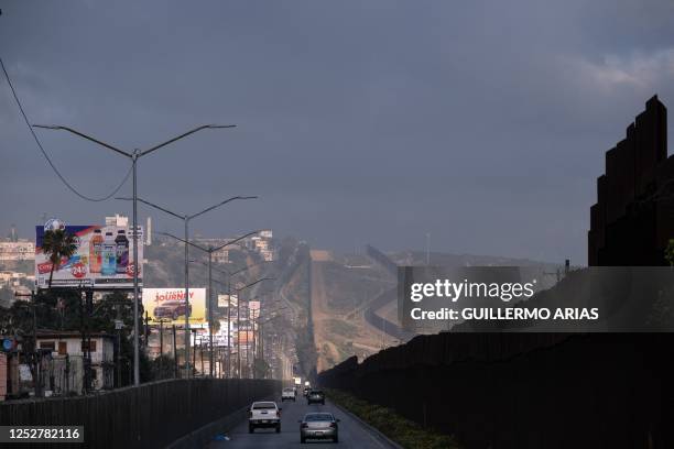 Picture of a section of the US-Mexico border wall in Tijuana, Baja California State, Mexico, taken on May 6, 2023. - A surge of migrants is expected...