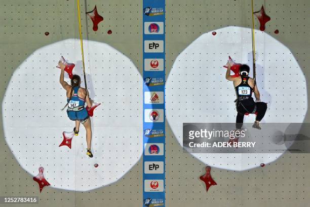 Poland's speed climber Natalia Kalucka and China's speed climber Deng Lijuan compete in the Women's qualifying speed discipline at the IFSC Climbing...