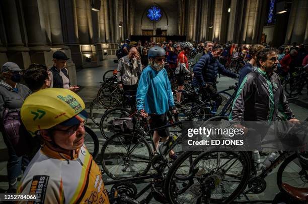 Cyclists attend the 25th annual 'Blessing of the Bicycles' celebration at the Cathedral of St. John the Divine in New York city May 6, 2023.