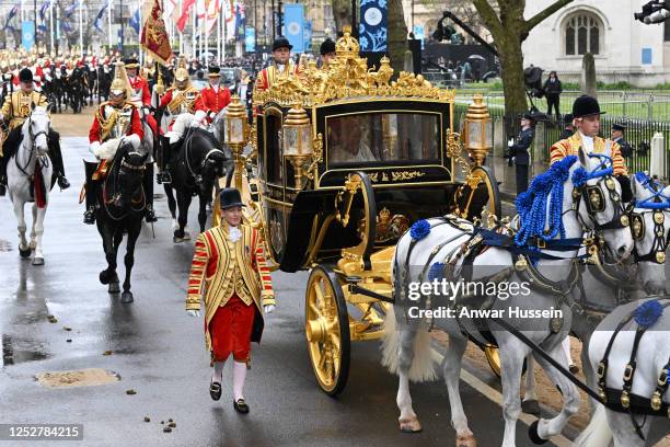 King Charles lll and Queen Camilla arrive at Westminster Abbey in the Diamond Jubilee Coach to attend their coronation on May 06, 2023 in London,...