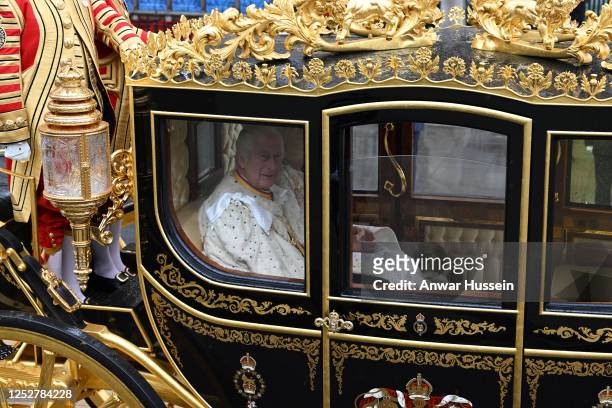 King Charles lll and Queen Camilla arrive at Westminster Abbey in the Diamond Jubilee Coach to attend their coronation on May 06, 2023 in London,...