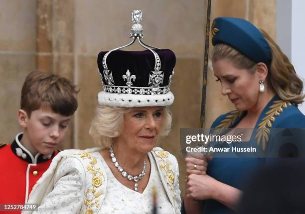 Queen Camilla, watched by Penny Mordaunt, Lord President of the Council, departs Westminster Abbey following her and King Charles III's coronation at...