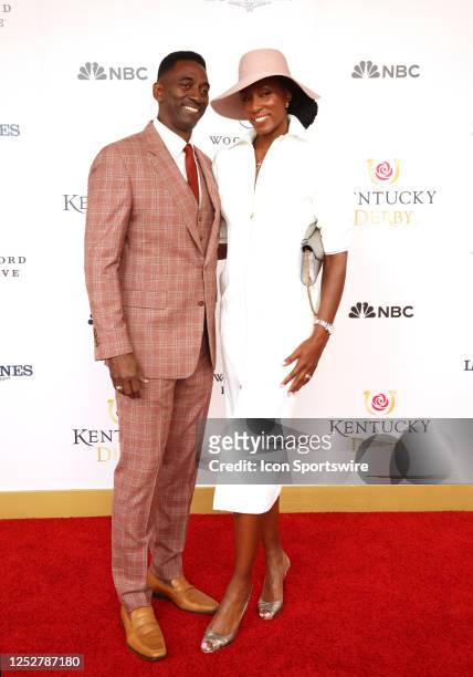 Legend Lisa Leslie and husband Michael Lockwood walk the red carpet at the 149th running of the Kentucky Derby on May 6 at Churchill Downs in...