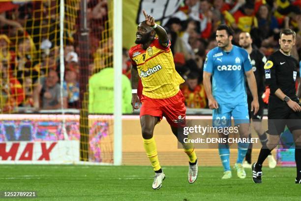 Lens' Franco-Ivorian midfielder Seko Fofana celebrates scoring his team's first goal during the French L1 football match between RC Lens and...