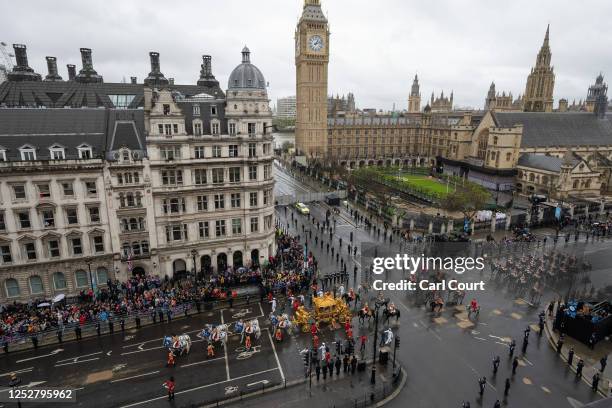 King Charles III and Camilla, Queen Consort travelling in the Diamond Jubilee Coach built in 2012 to commemorate the 60th anniversary of the reign of...