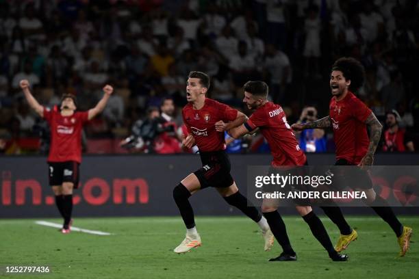 Osasuna's Spanish midfielder Lucas Torro celebrates after scoring his team's first goal during the Spanish Copa del Rey final football match between...