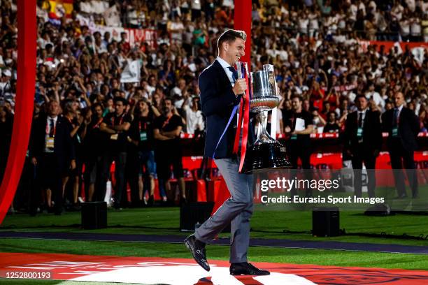 Joaquín Sánchez of Real Betis takes the trophy for the pitch during Copa del Rey Final match between Real Madrid and CA Osasuna at Estadio de La...