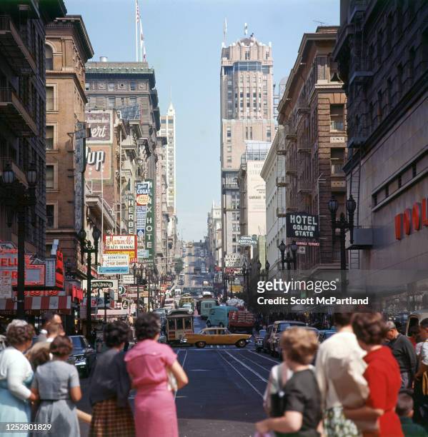 View, looking north, along Powell Street in the Tenderloin district, San Francisco, California, August 1963. Visible in the background are the Golden...