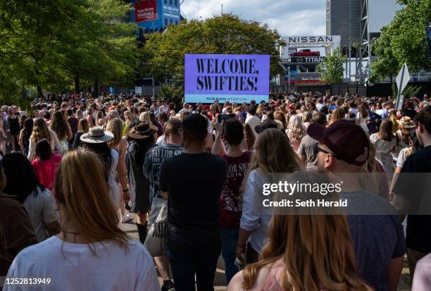 Fans wait in line outside of Nissan Stadium ahead of artist Taylor Swift's second night of performance on May 6, 2023 in Nashville, Tennessee....