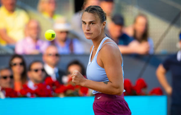 Aryna Sabalenka of Belarus in action against Iga Swiatek of Poland in the singles final on Day Thirteen of the Mutua Madrid Open at La Caja Magica on...