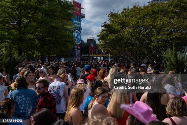 Fans wait in line outside of Nissan Stadium ahead of artist Taylor Swift's second night of performance on May 6, 2023 in Nashville, Tennessee....