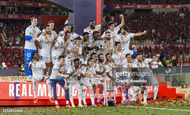 Players of Real Madrid pose for a team photo after winning the Copa del Rey final soccer match between Real Madrid and Osasuna at the La Cartuja...