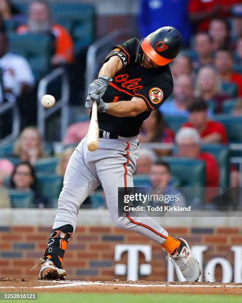 Adam Frazier of the Baltimore Orioles hits a two RBI single during the fourth inning against the Atlanta Braves at Truist Park on May 6, 2023 in...