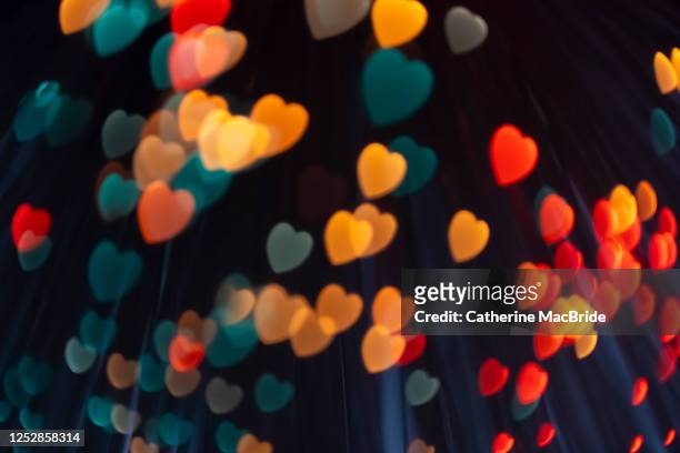 pink heart shaped light bokeh - catherine macbride stock pictures, royalty-free photos & images