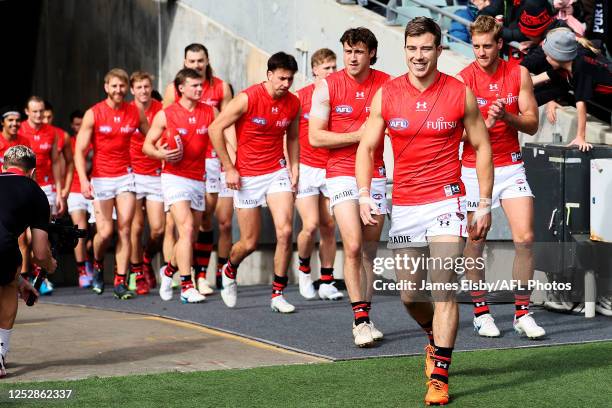 Zach Merrett of the Bombers runs out during the 2023 AFL Round 08 match between the Port Adelaide Power and the Essendon Bombers at Adelaide Oval on...
