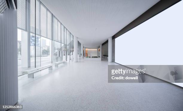 empty long passageway in modern building - office stock-fotos und bilder
