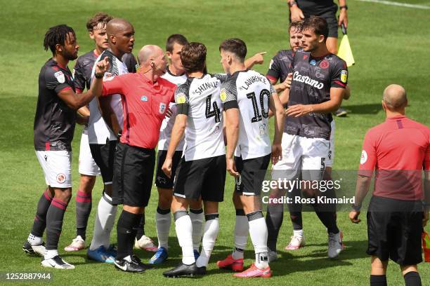 Referee Scott Duncan shows the red card to Tom Lawrence of Derby County and Matt Miazga of Reading at the end of the Sky Bet Championship match...