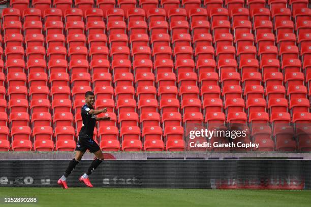 Ashley Fletcher of Middlesbrough celebrates after scoring the opening goal during the Sky Bet Championship match between Stoke City and Middlesbrough...