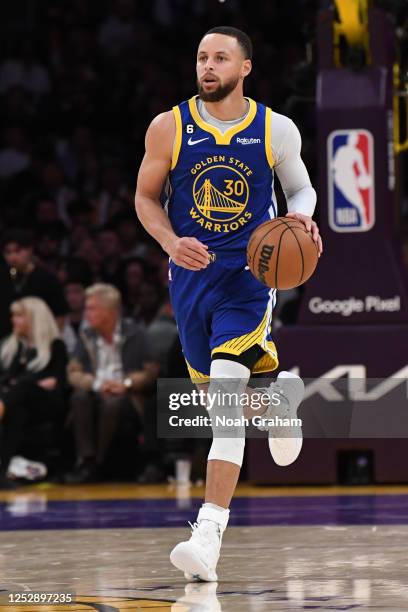 Stephen Curry of the Golden State Warriors dribbles the ball during the game against the Los Angeles Lakers during the Western Conference Semi Finals...