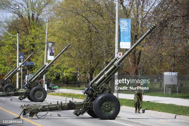 Soldiers from the Canadian military prepare to fire a 21 gun salute during the celebration for the coronation of King Charles III at the Ontario...