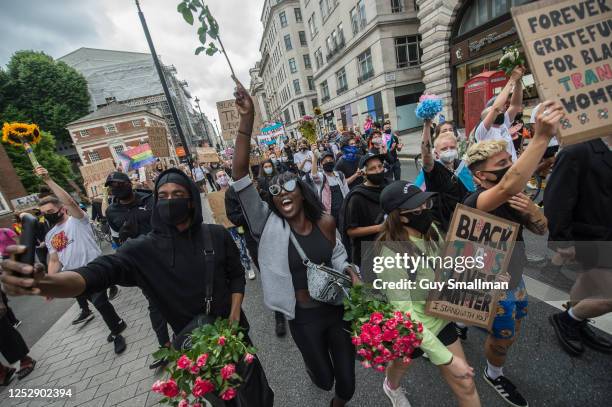 The protest approaches Trafalgar Square during a march in support of the Black LGBTQ+ community on June 27, 2020 in London, England. The Black Trans...