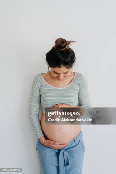 portrait of a future mother - pregnant isolated stock pictures, royalty-free photos & images